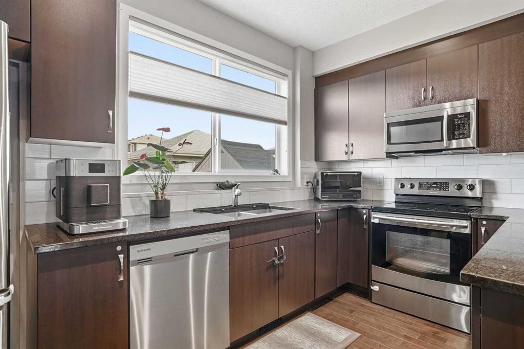 72 Redstone Common Ne, Calgary, AB - Indoor Photo Showing Kitchen With Double Sink