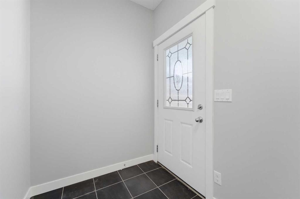 174 Morningside Circle Sw, Airdrie, AB - Indoor Photo Showing Other Room