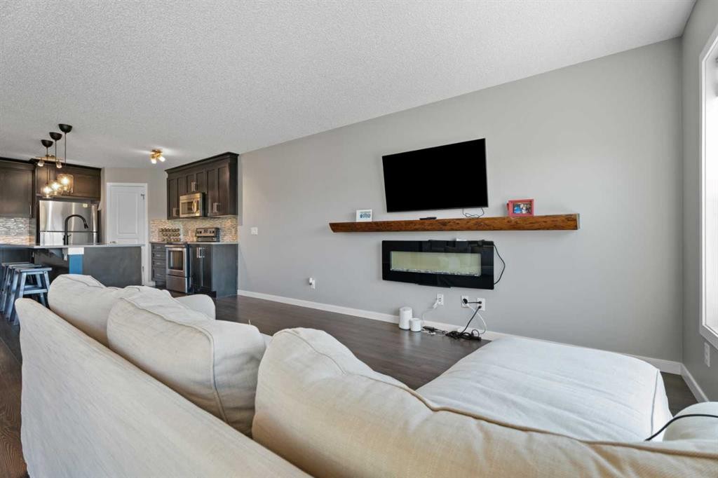 139 Auburn Meadows Place Se, Calgary, AB - Indoor Photo Showing Living Room With Fireplace