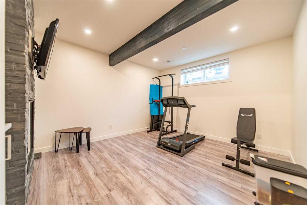 83 Auburn Glen Lane Se, Calgary, AB - Indoor Photo Showing Gym Room