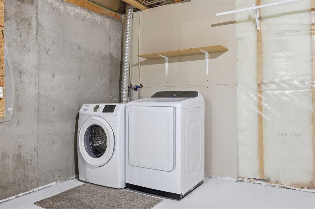 103-760 Railway Gate Sw, Airdrie, AB - Indoor Photo Showing Laundry Room