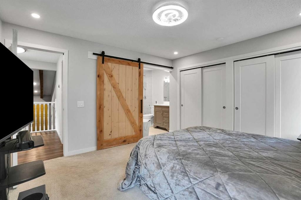 36 Coach Manor Rise Sw, Calgary, AB - Indoor Photo Showing Bedroom