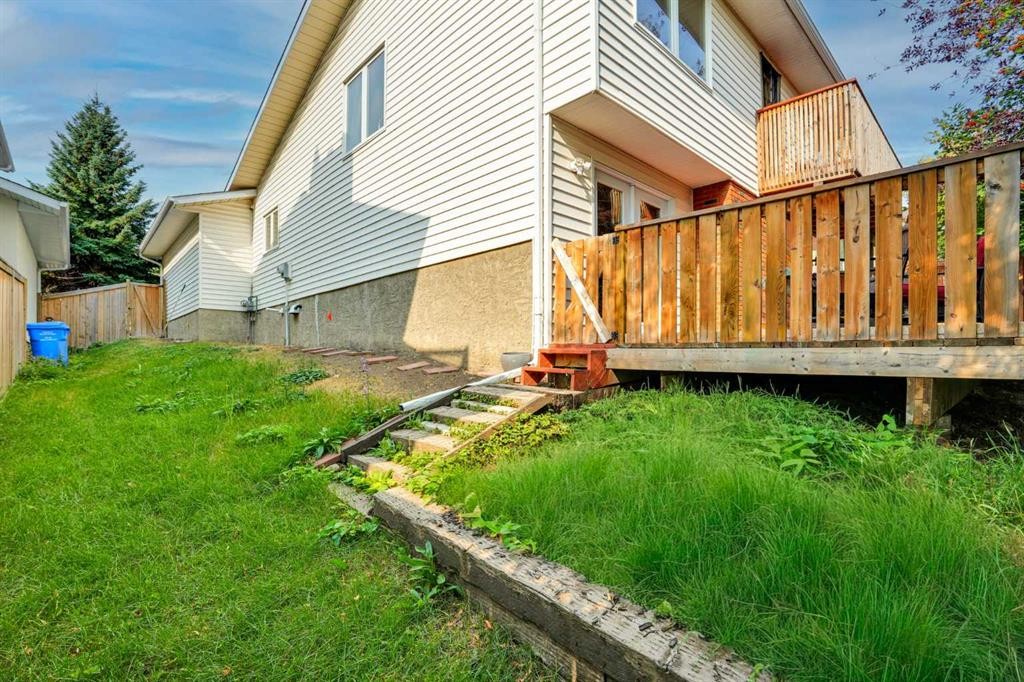 36 Coach Manor Rise Sw, Calgary, AB - Outdoor With Deck Patio Veranda