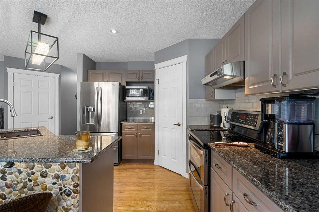 224 Arbour Ridge Way Nw, Calgary, AB - Indoor Photo Showing Kitchen With Stainless Steel Kitchen With Double Sink With Upgraded Kitchen