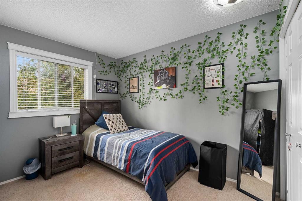 224 Arbour Ridge Way Nw, Calgary, AB - Indoor Photo Showing Bedroom