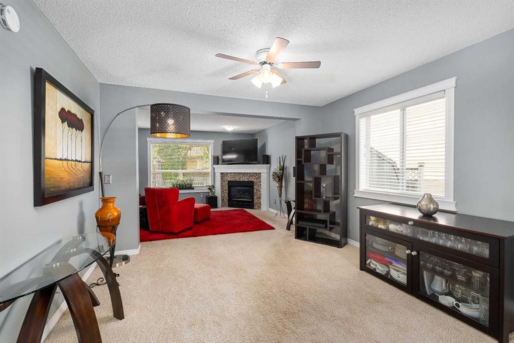 224 Arbour Ridge Way Nw, Calgary, AB - Indoor With Fireplace