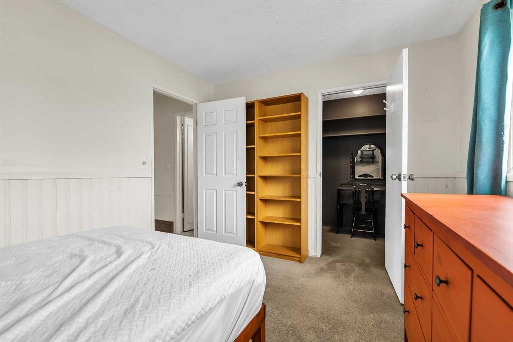151 Midbend Place Se, Calgary, AB - Indoor Photo Showing Bedroom