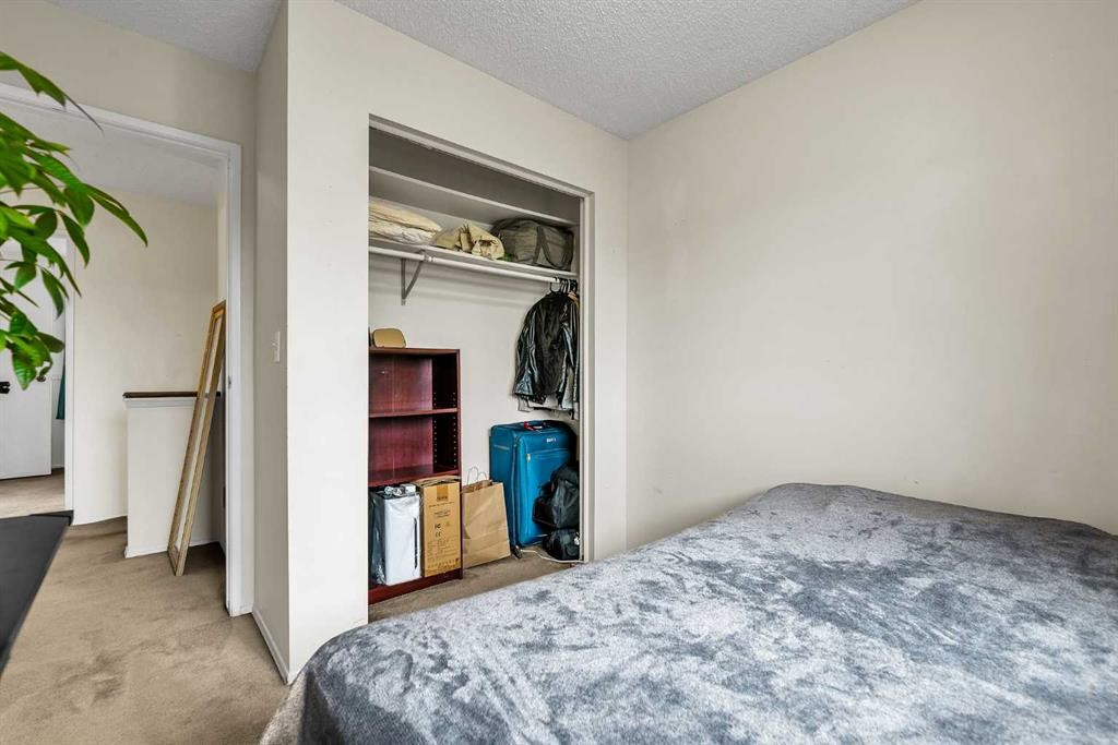 151 Midbend Place Se, Calgary, AB - Indoor Photo Showing Bedroom