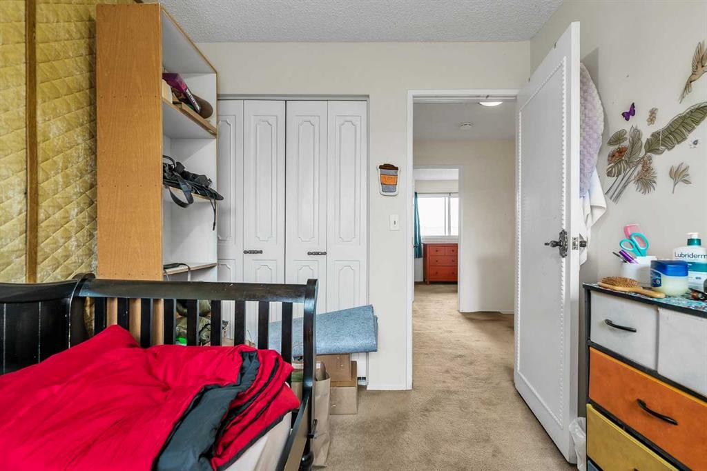 151 Midbend Place Se, Calgary, AB - Indoor Photo Showing Bedroom