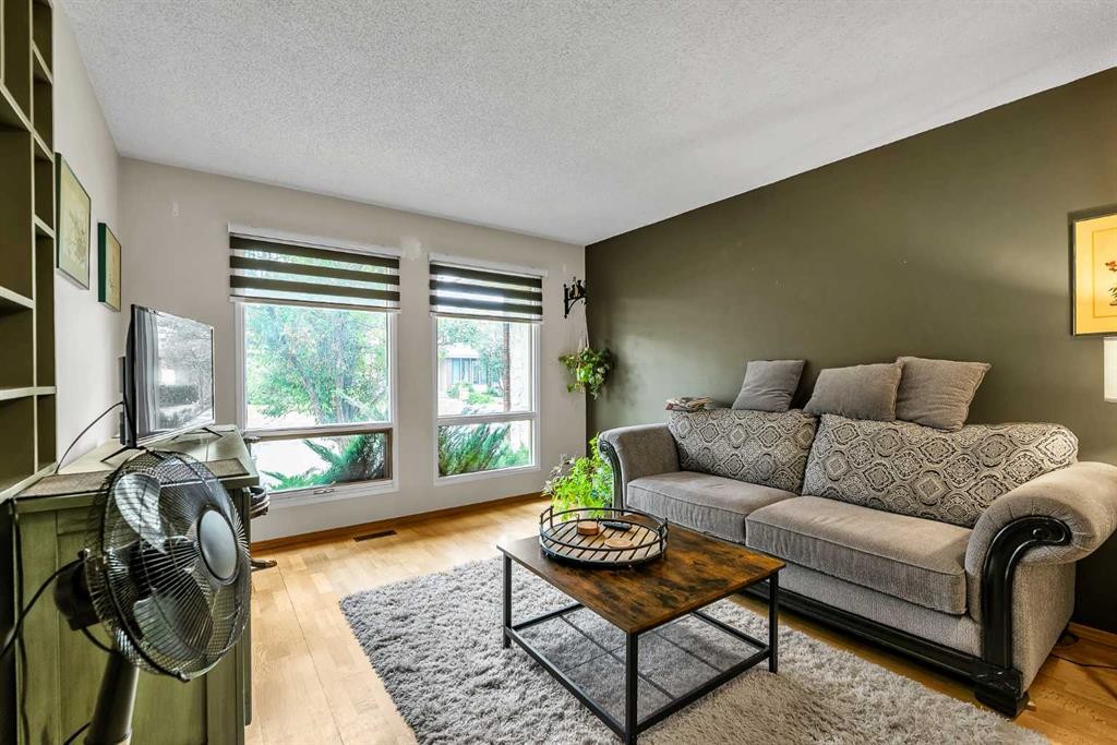 151 Midbend Place Se, Calgary, AB - Indoor Photo Showing Living Room