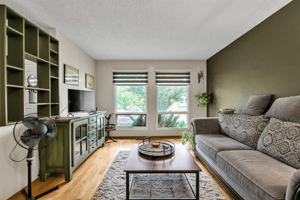 151 Midbend Place Se, Calgary, AB - Indoor Photo Showing Living Room