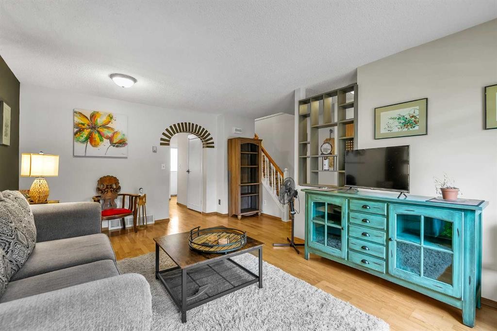 151 Midbend Place Se, Calgary, AB - Indoor Photo Showing Living Room