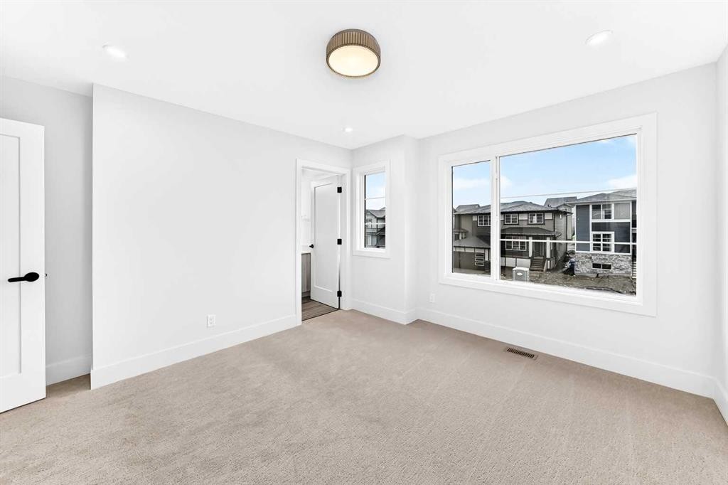 270 Greystone Boulevard, Cochrane, AB - Indoor Photo Showing Other Room