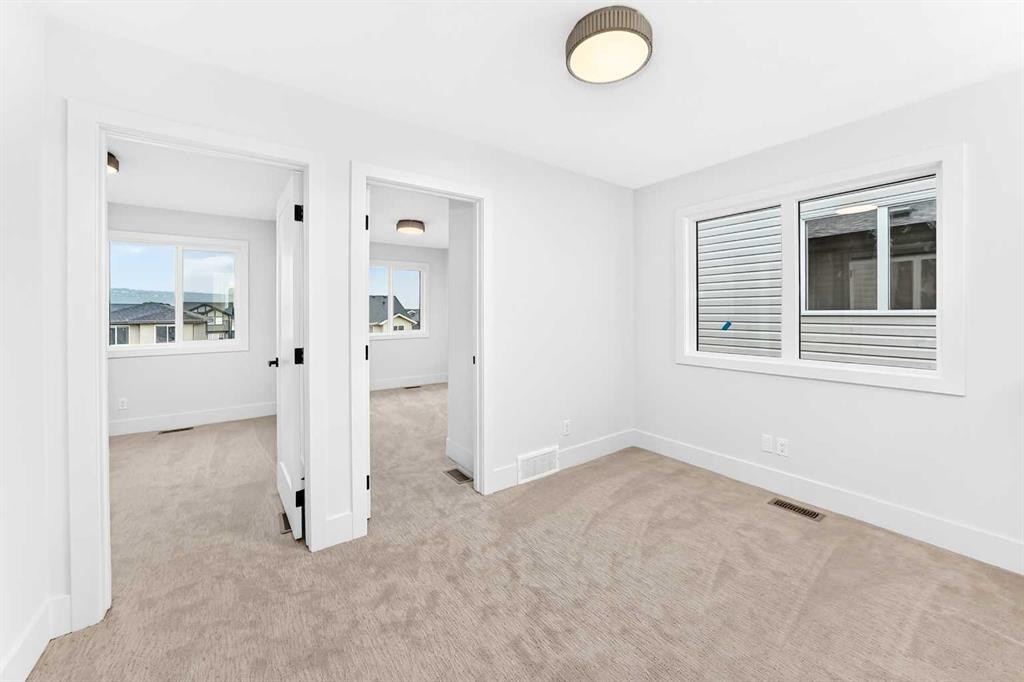 270 Greystone Boulevard, Cochrane, AB - Indoor Photo Showing Other Room