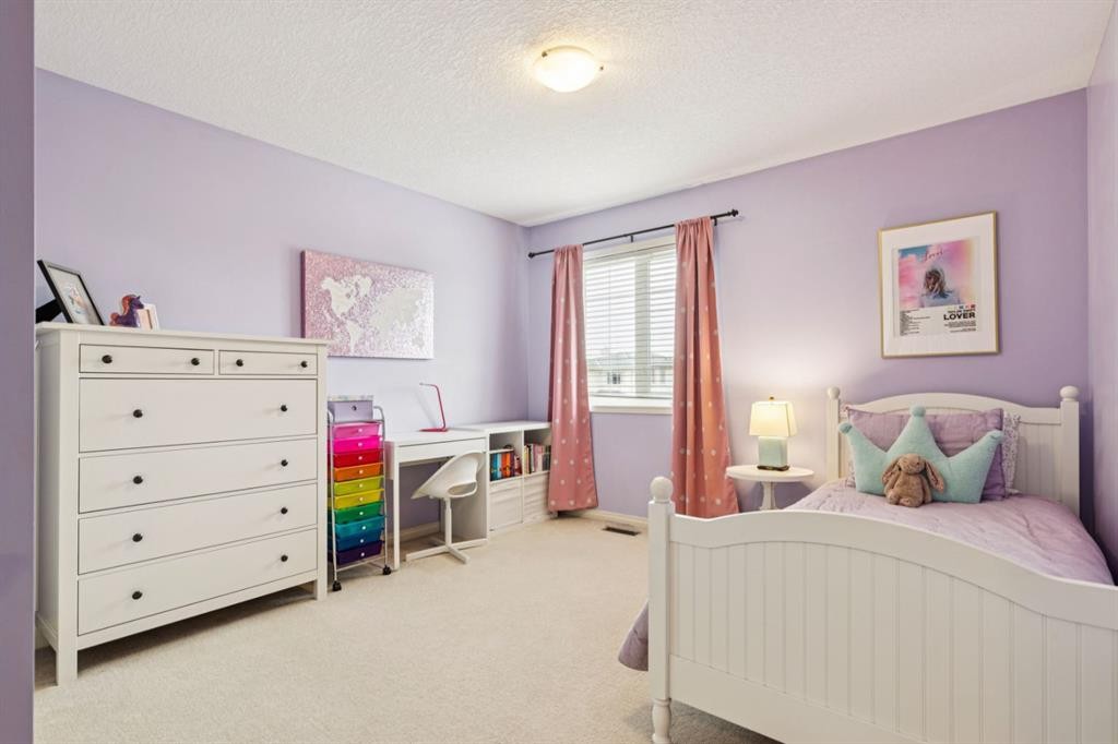 51 Sienna Park Crescent Sw, Calgary, AB - Indoor Photo Showing Bedroom