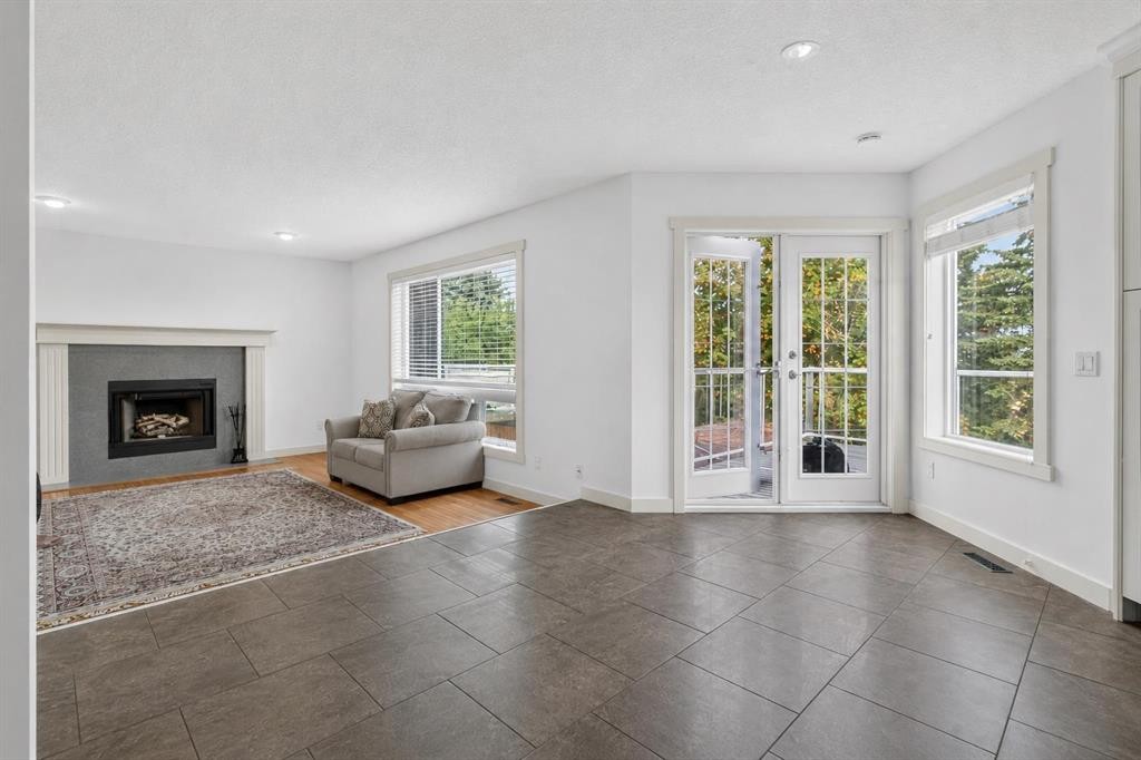 2888 Signal Hill Drive Sw, Calgary, AB - Indoor Photo Showing Living Room With Fireplace