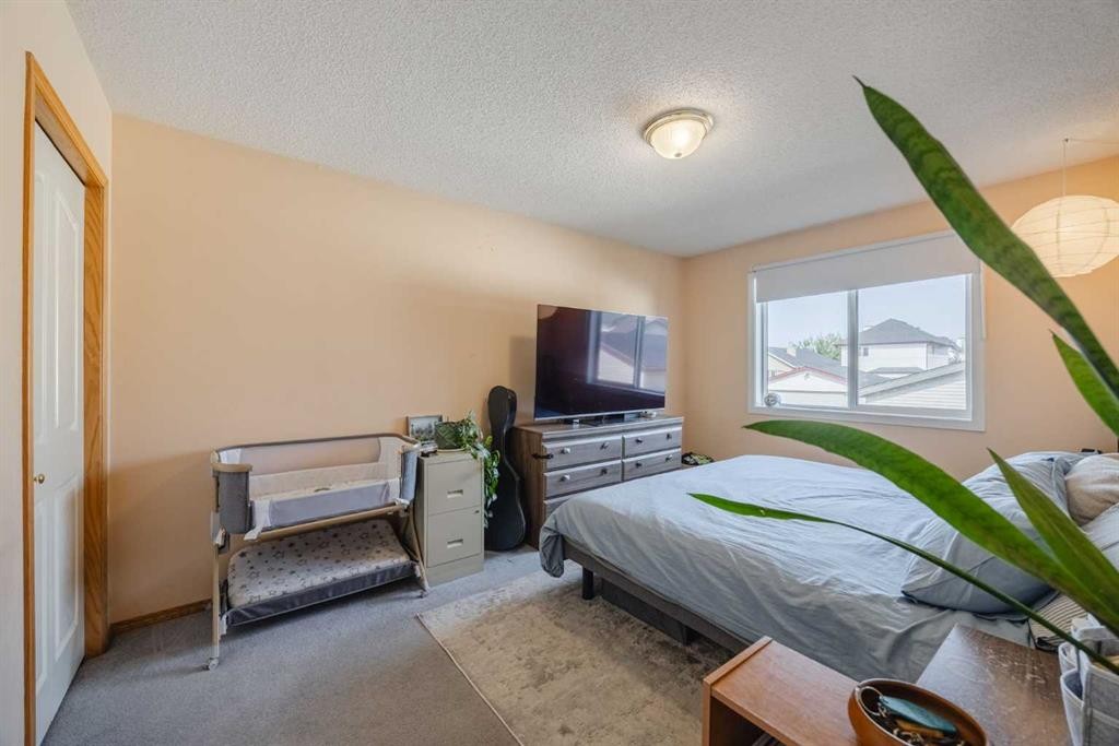 23 Tarington Way Ne, Calgary, AB - Indoor Photo Showing Bedroom