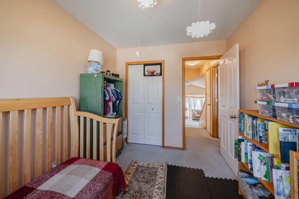 23 Tarington Way Ne, Calgary, AB - Indoor Photo Showing Bedroom