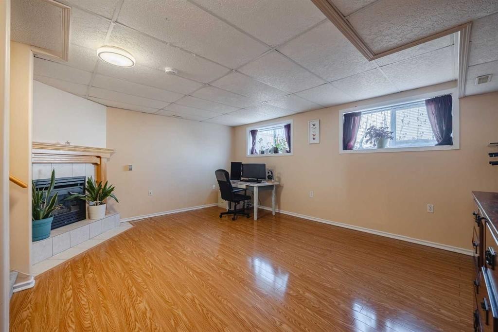 23 Tarington Way Ne, Calgary, AB - Indoor With Fireplace