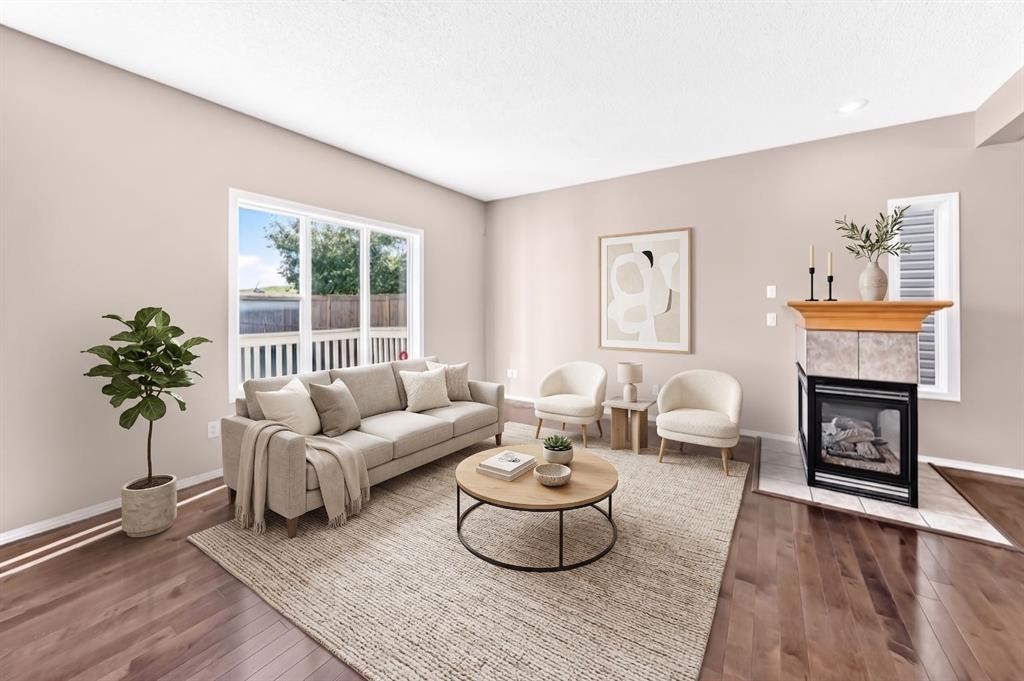 16 Royal Birch Rise Nw, Calgary, AB - Indoor Photo Showing Living Room With Fireplace