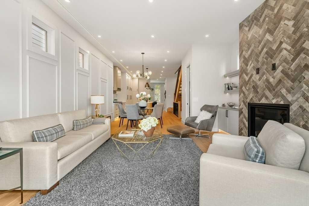 2311 6 Avenue Nw, Calgary, AB - Indoor Photo Showing Living Room With Fireplace