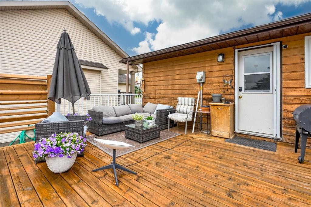 121 Edey Close, Cremona, AB - Outdoor With Deck Patio Veranda With Exterior