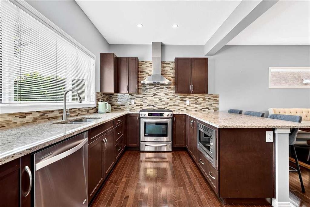 60 Mahogany Grove Se, Calgary, AB - Indoor Photo Showing Kitchen With Double Sink With Upgraded Kitchen