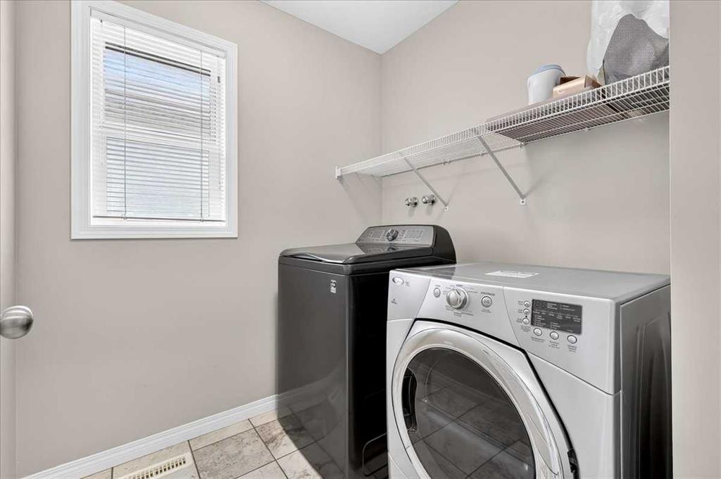 60 Mahogany Grove Se, Calgary, AB - Indoor Photo Showing Laundry Room