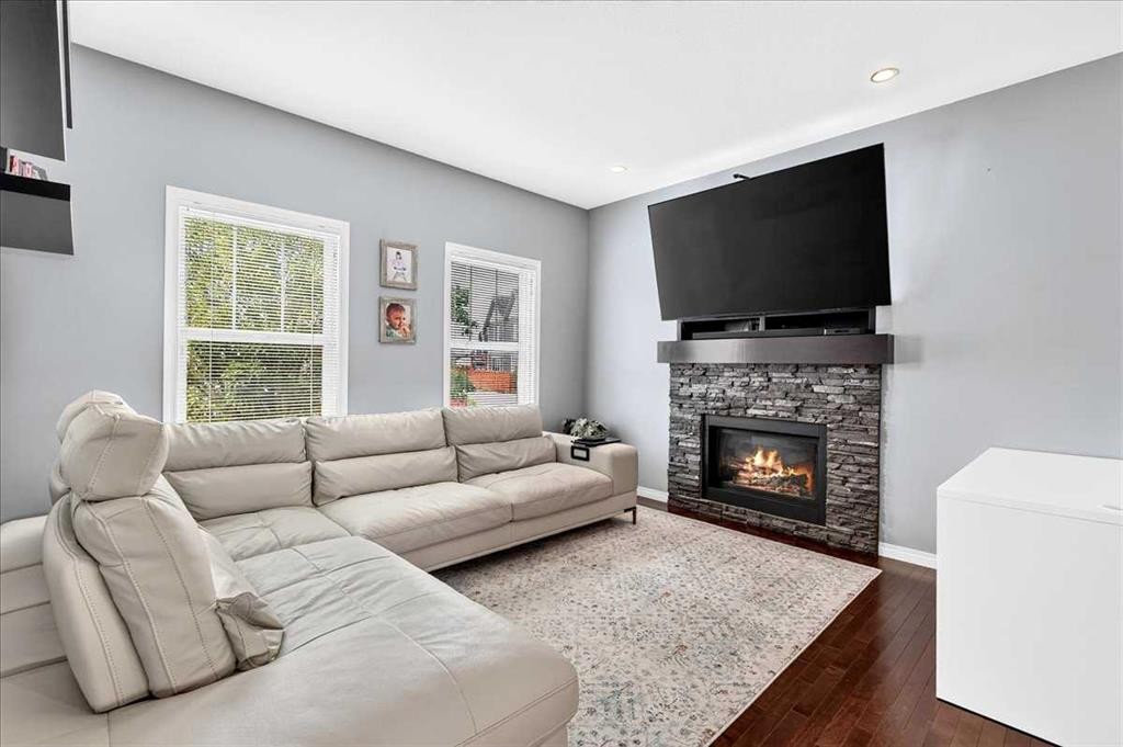 60 Mahogany Grove Se, Calgary, AB - Indoor Photo Showing Living Room With Fireplace