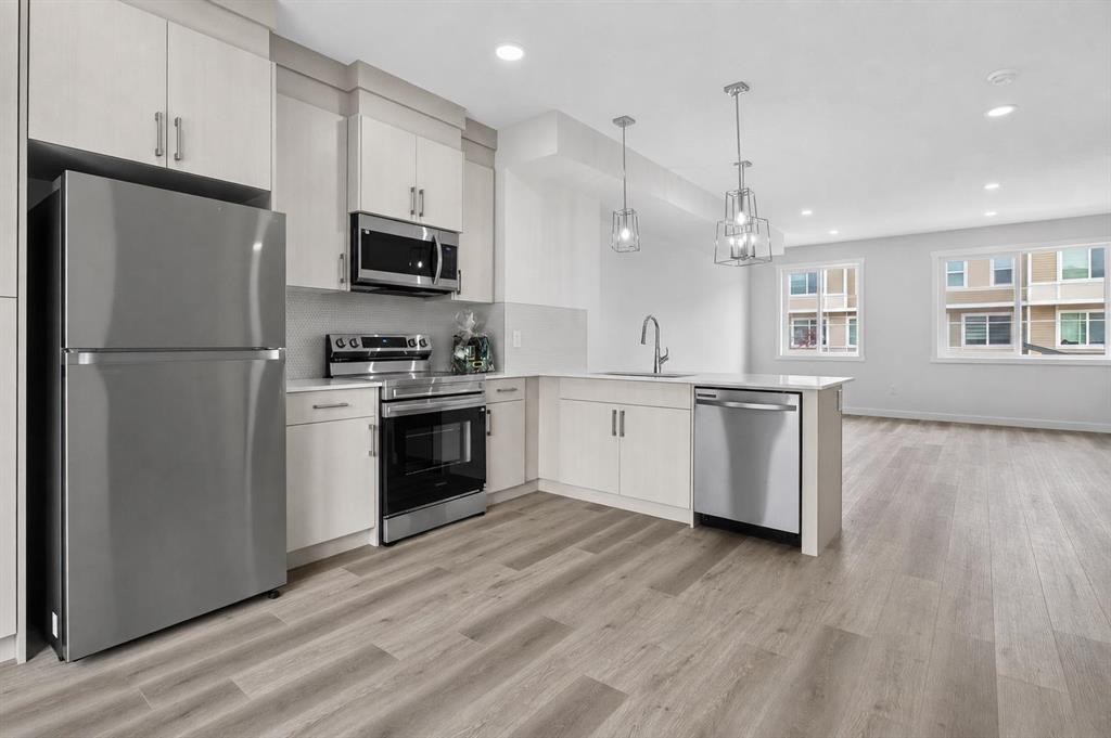 207-75 Cornerstone Row Ne, Calgary, AB - Indoor Photo Showing Kitchen With Stainless Steel Kitchen With Upgraded Kitchen