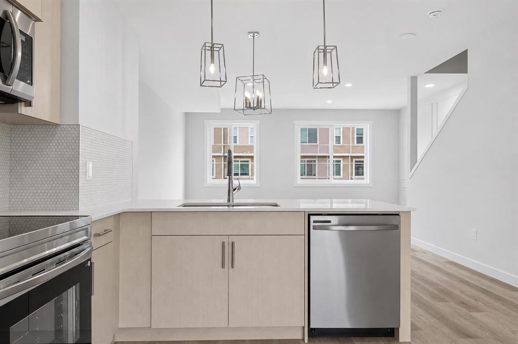 207-75 Cornerstone Row Ne, Calgary, AB - Indoor Photo Showing Kitchen With Upgraded Kitchen