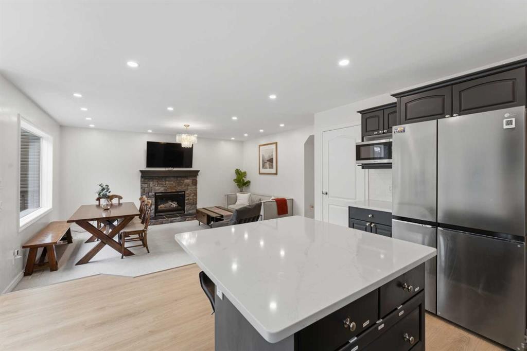 50 Somerglen Park Sw, Calgary, AB - Indoor With Fireplace