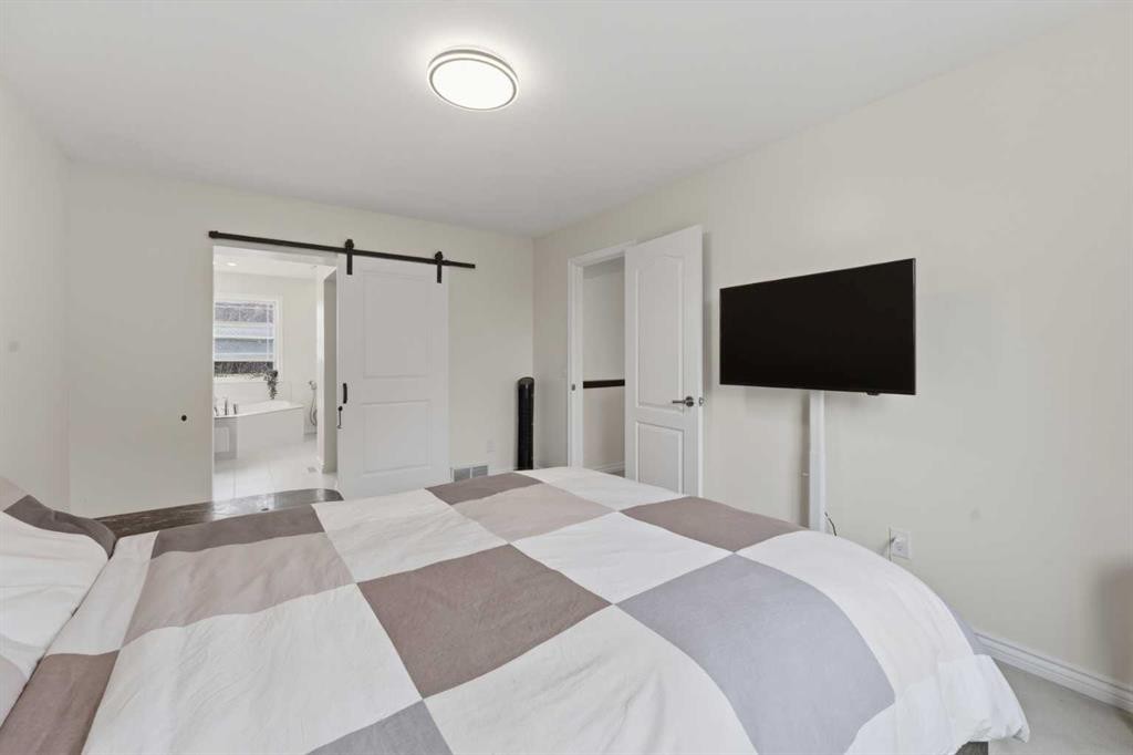 50 Somerglen Park Sw, Calgary, AB - Indoor Photo Showing Bedroom
