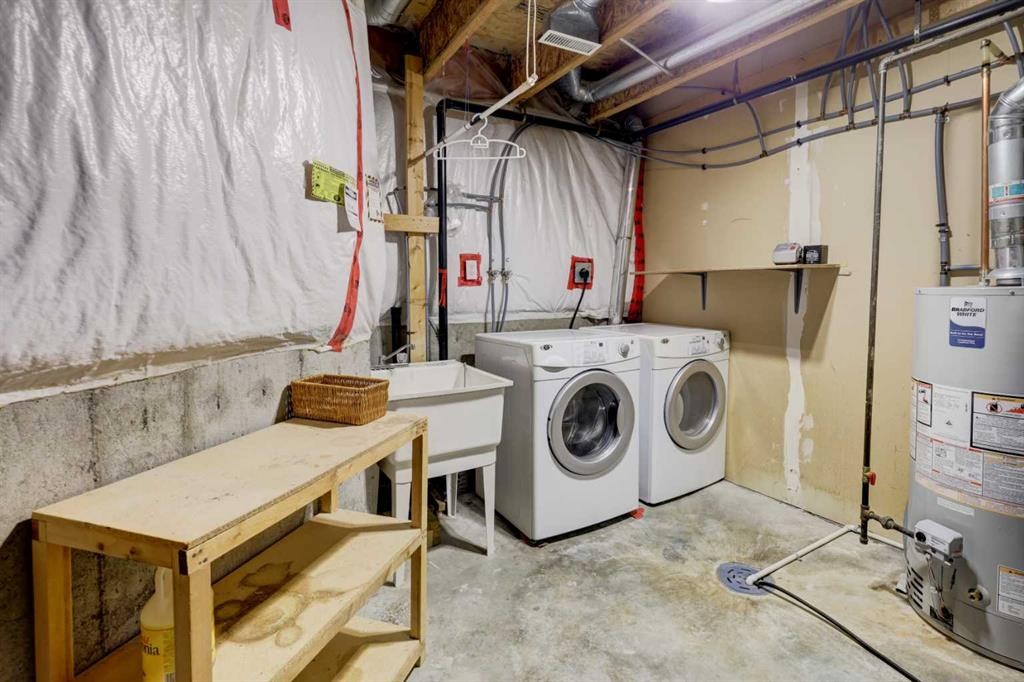 57 Sandpiper Lane Nw, Calgary, AB - Indoor Photo Showing Laundry Room