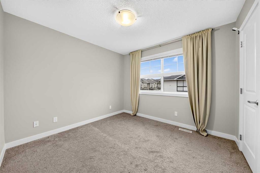 87 Legacy View Se, Calgary, AB - Indoor Photo Showing Other Room