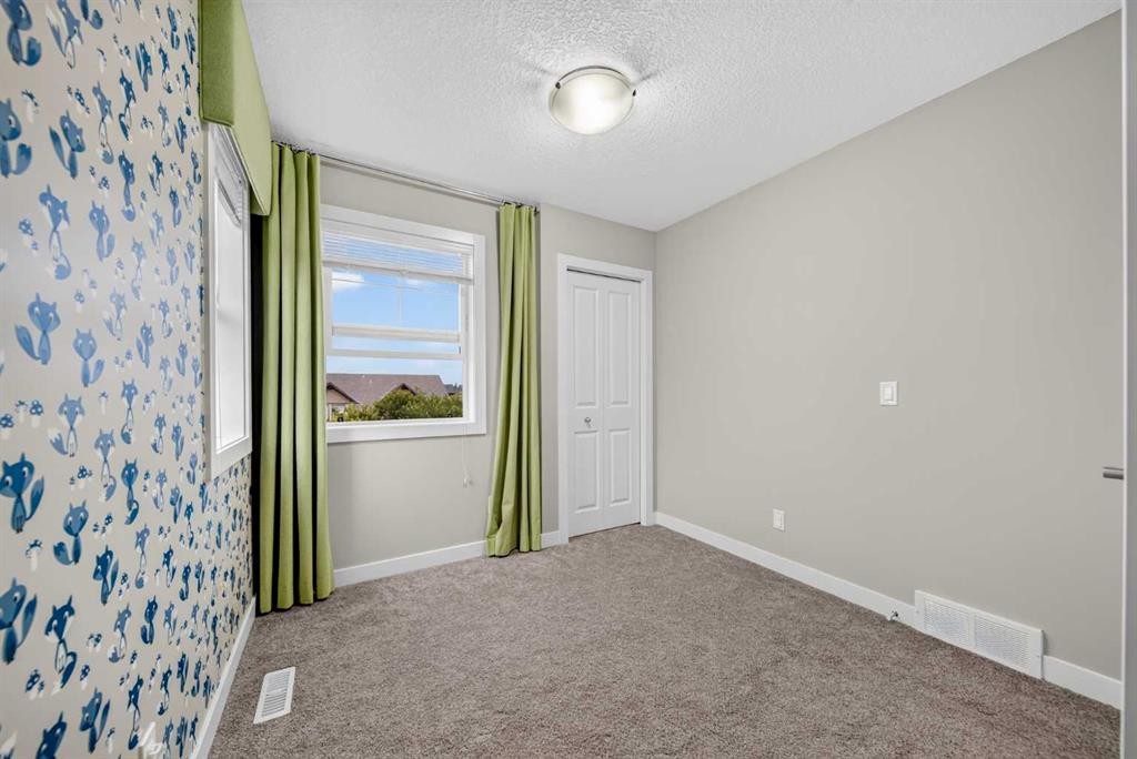 87 Legacy View Se, Calgary, AB - Indoor Photo Showing Other Room