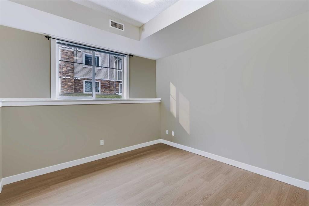 210-300 Marina Drive, Chestermere, AB - Indoor Photo Showing Other Room