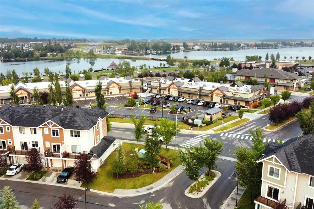 210-300 Marina Drive, Chestermere, AB - Outdoor With Body Of Water With View