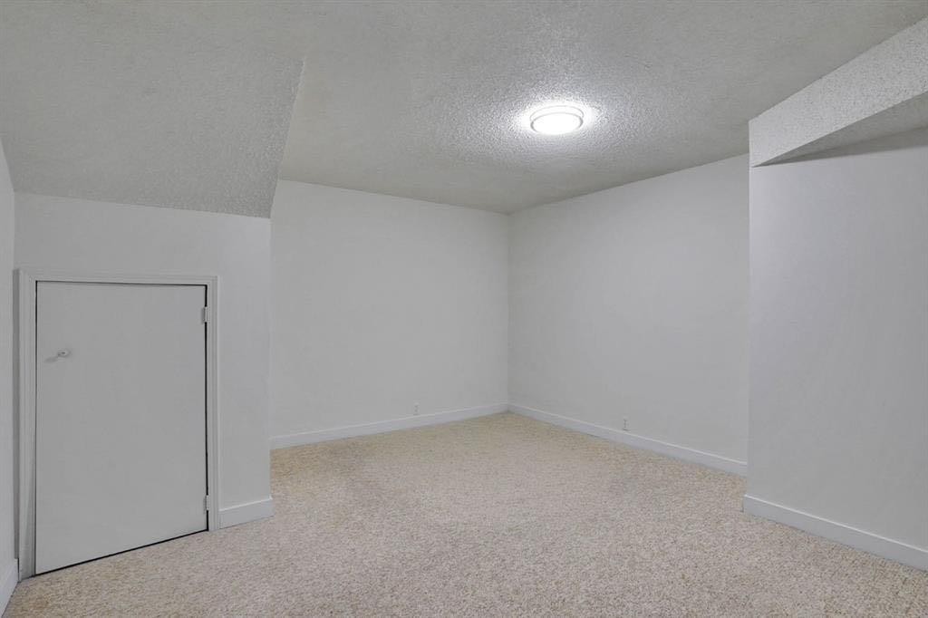 112 Martinglen Close Ne, Calgary, AB - Indoor Photo Showing Other Room
