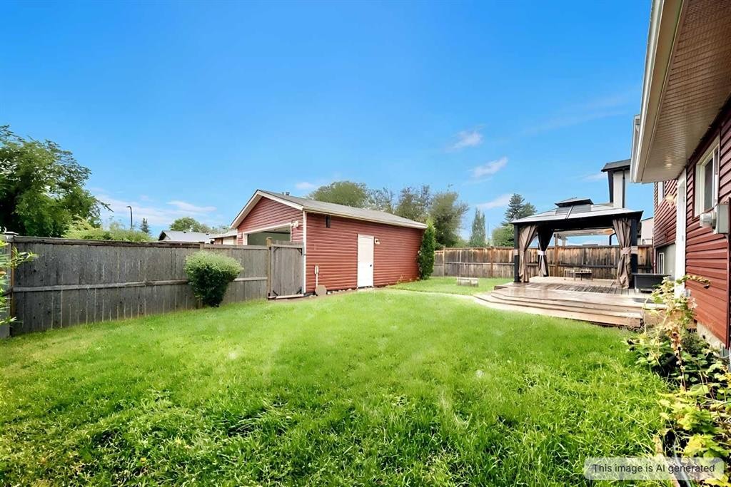 14672 Deer Ridge Drive Se, Calgary, AB - Outdoor With Deck Patio Veranda With Backyard