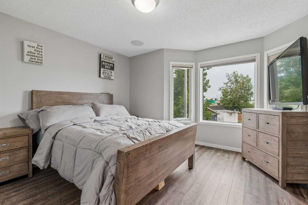230 Mt Lorette Place Se, Calgary, AB - Indoor Photo Showing Bedroom