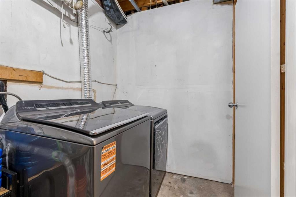 230 Mt Lorette Place Se, Calgary, AB - Indoor Photo Showing Laundry Room