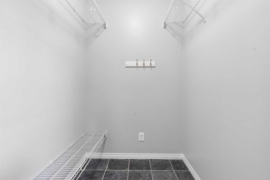 230 Mt Lorette Place Se, Calgary, AB - Indoor With Storage