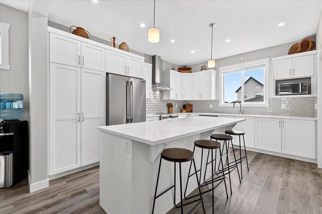 163 Copperleaf Way Se, Calgary, AB - Indoor Photo Showing Kitchen With Upgraded Kitchen