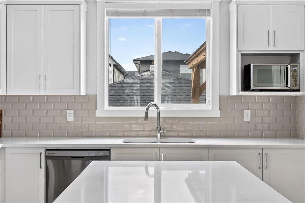163 Copperleaf Way Se, Calgary, AB - Indoor Photo Showing Kitchen With Upgraded Kitchen