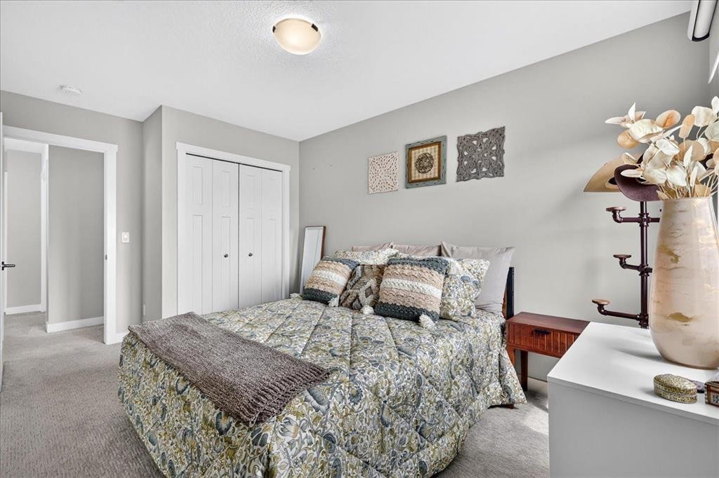 163 Copperleaf Way Se, Calgary, AB - Indoor Photo Showing Bedroom