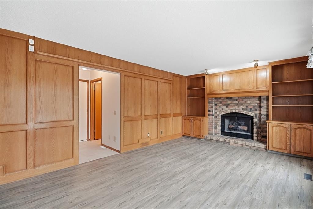61 Shannon Crescent Sw, Calgary, AB - Indoor With Fireplace
