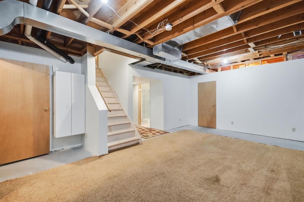 61 Shannon Crescent Sw, Calgary, AB - Indoor Photo Showing Basement