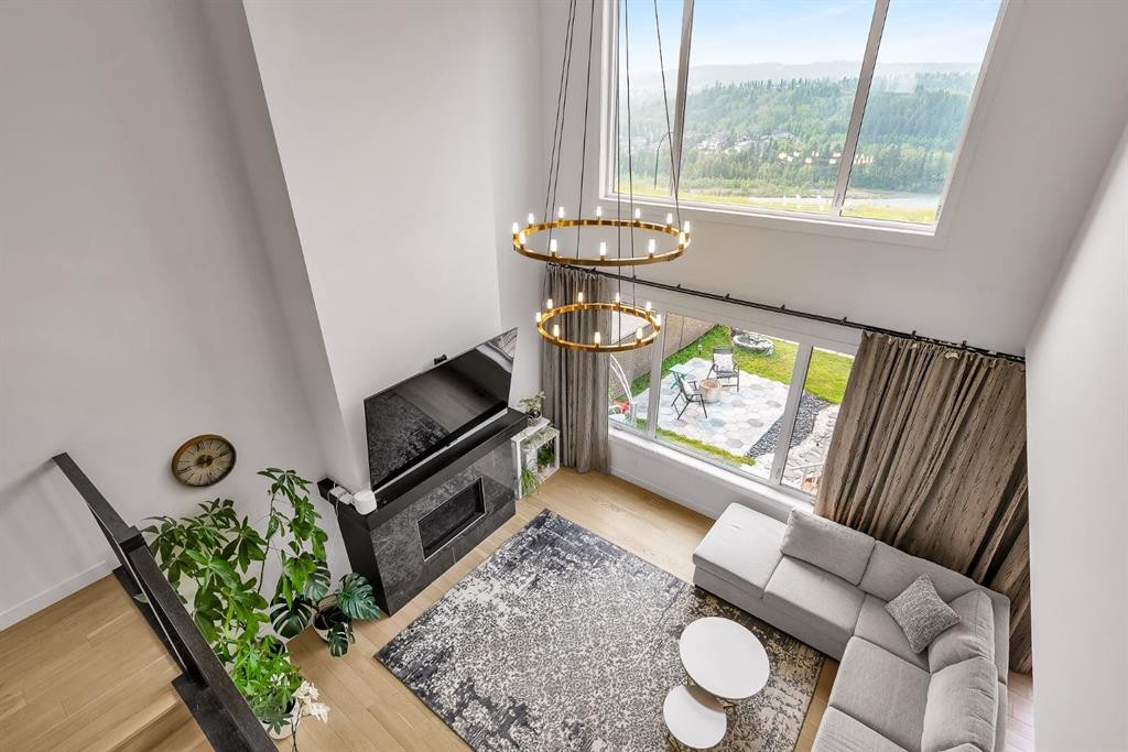 406 Rowley Way Nw, Calgary, AB - Indoor With Fireplace