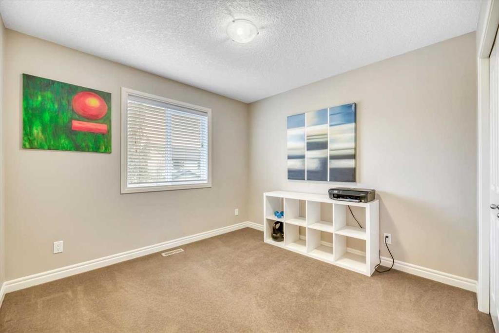 13 Cranberry Avenue Se, Calgary, AB - Indoor Photo Showing Other Room
